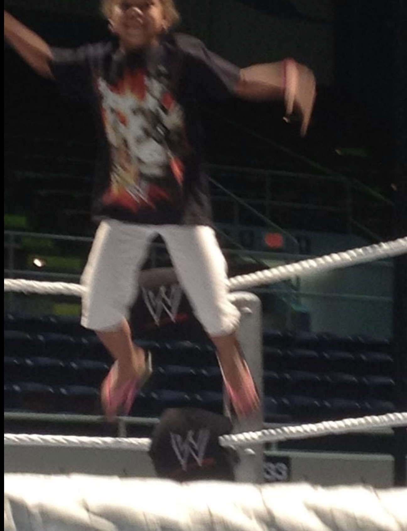 Kip's daughter jumping in an empty WWE ring